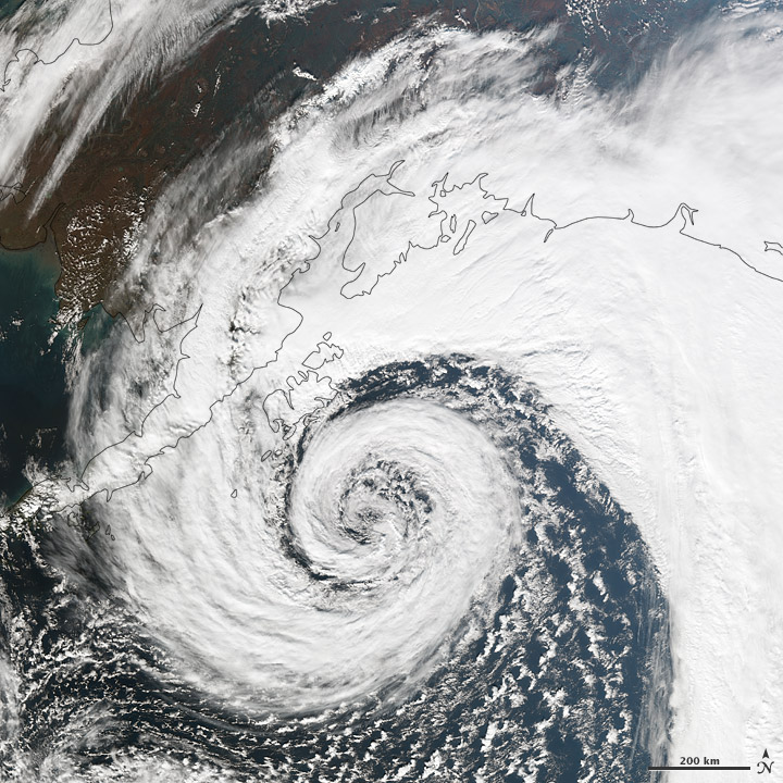 A strong storm from 2012 in Alaska illustrates the spiral patterns in low-pressure regions. Credit: NASA.